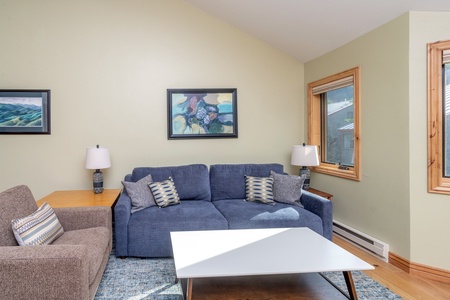 Spacious living room with vaulted ceilings and amazing views of Ballard Peak