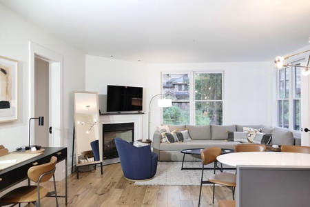 Spacious living area with Ballard peak views and a great fireplace