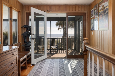 Doors to first floor screened deck