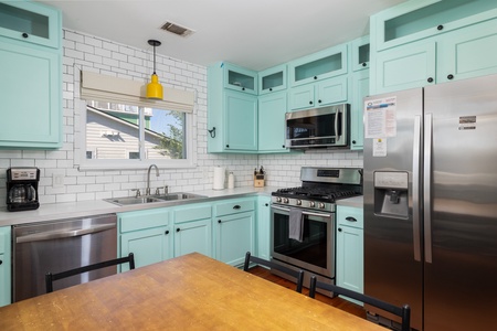 This cheery kitchen has everything you need to make your favorite meals
