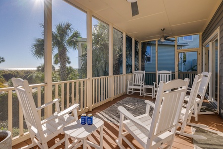The screened porch is the perfect spot to unwind