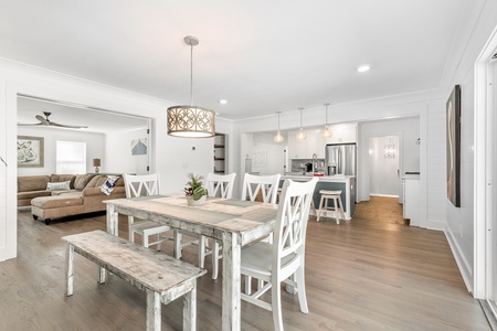 Your bright open-concept living space flows seamlessly from dining to kitchen, perfect for gathering with loved ones over home-cooked meals.