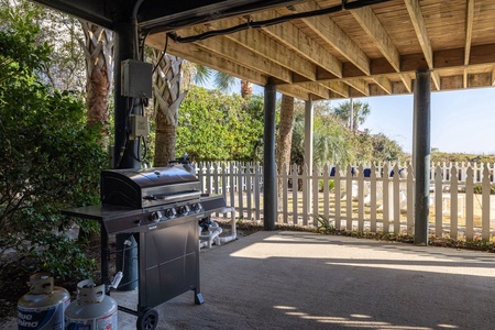 Fire up the grill under your shaded patio pavilion