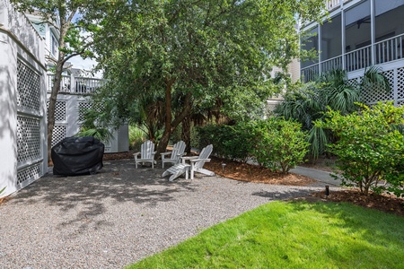 Gas grill in a nice shady spot.