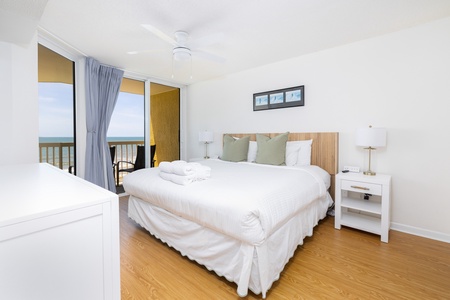A large king bed awaits you in the primary bedroom