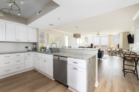 Your fully-equipped kitchen is just down the hall from the entryway