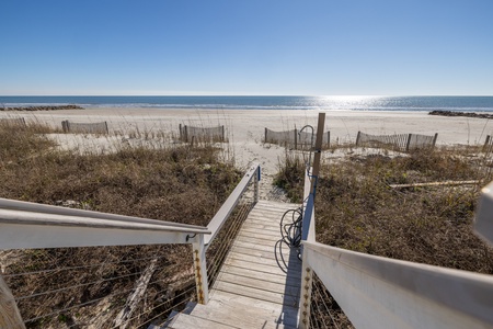 Our Sanctuary features a private boardwalk with shower leading directly down to the sand