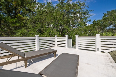 Sunbathing on the rooftop deck