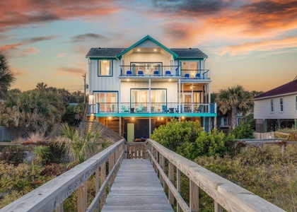 Your dream getaway starts here — direct beach access and a stunning coastal facade.
