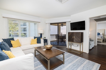 Just off the living room is your very own screened in patio