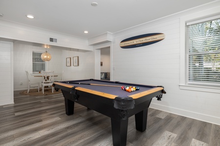 Challenge friends to a game of pool on this professional billiards table