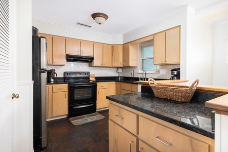 A fully-equipped kitchen is ready for mealtime