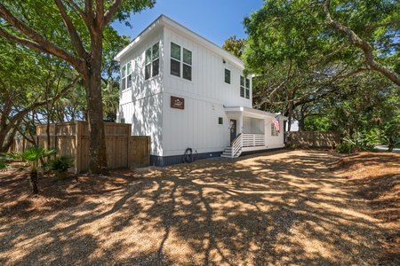 Located on a corner lot of East Ashley Ave, Follynesia is a quiet, modern retreat just steps from the beach