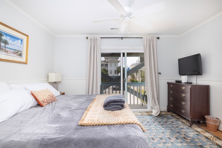 Your primary bedroom features a king bed, en suite bathroom, and its very own porch access