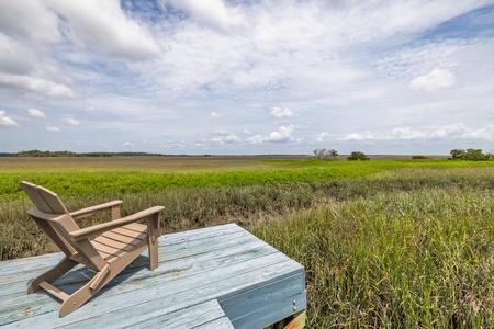 Take in the breathtaking sights of the marsh from your private dock