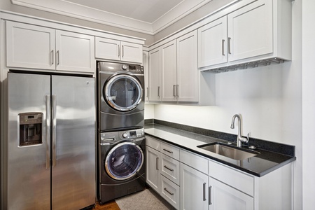 Laundry, additional fridge space & sink