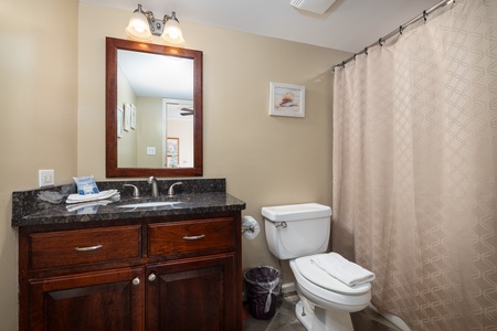 Your queen en suite offers a tub-shower combo