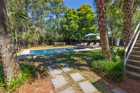 Stone steps lead you to your sparkling pool