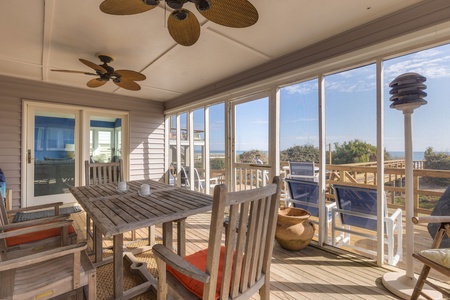 The screened-in porch is a great place to gather with friends and family