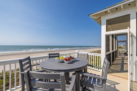 Enjoy morning coffee and coastal breezes on your private oceanfront deck