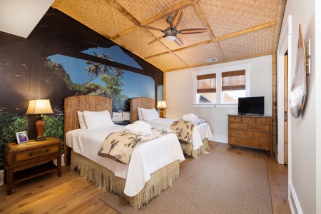 You'll find two more twin beds upstairs with their very own en suite bathroom