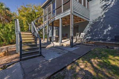 Walk up the steps to your elevated screened in front porch
