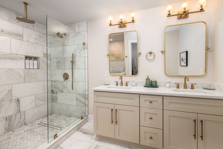 Primary ensuite has a large shower and double vanity