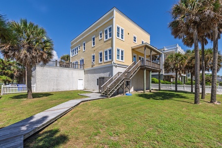 Follow the walkway from your covered balcony to the beach
