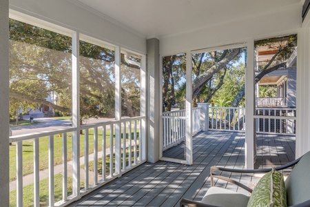 Your screened-in porch leads out to your open air deck
