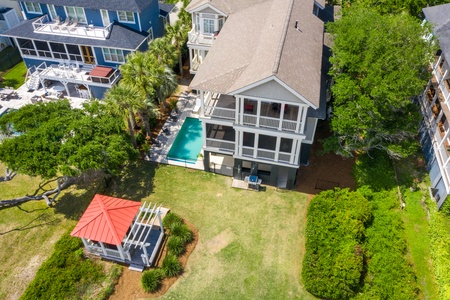Resort-style pool and expansive wraparound decks for soaking in ocean breezes and coastal views