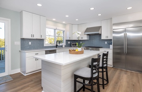The spacious breakfast bar is perfect for a snack or happy hour.