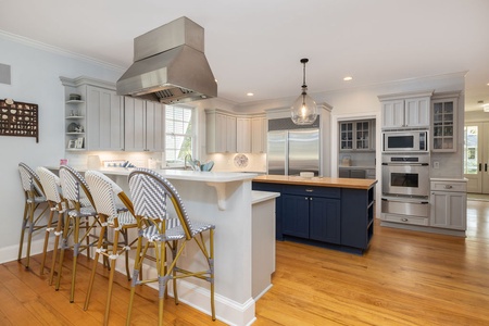 A chef’s dream – spacious, modern kitchen with seating for family and friends