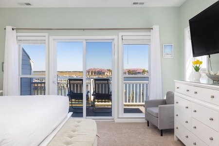 Watch the sunset from your private balcony located just off the primary bedroom