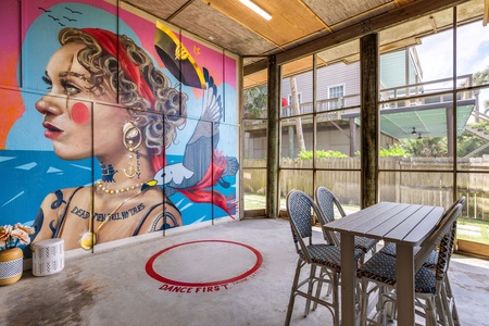 Another mural adorns your ground level game room