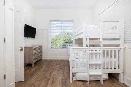Your main floor features a twin-over-full bunk bed with pullout trundle