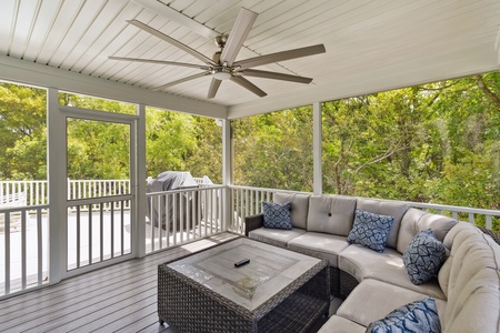 Get some fresh air in your upstairs screened-in porch