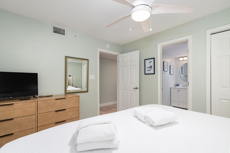 Unwind in your serene bedroom with fresh linens, modern amenities, and private ensuite - your peaceful retreat awaits.