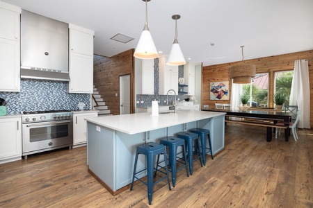 Your spacious kitchen provides views of the whole main floor living space