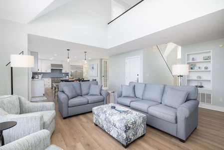 Unwind in your bright, open living area that flows into the dining room and kitchen.