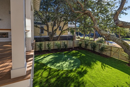Practice your putt without leaving home—this Isle of Palms vacation rental features a private putting green for laid-back coastal fun.