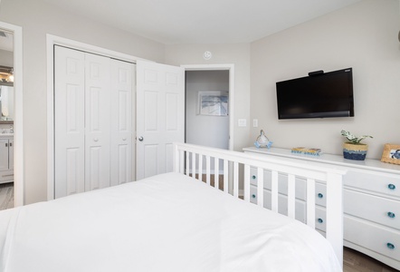 Full size bedrooom with TV.