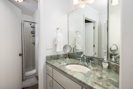 Freshen up in your primary bathroom with a walk-in shower