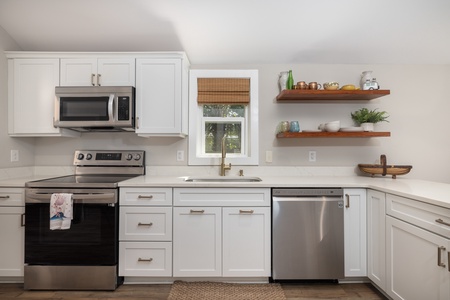 A fully-equipped kitchen is ready for mealtimes