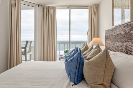 Wake up to breathtaking ocean views from your comfortable bed, with direct balcony access to soak in coastal serenity.