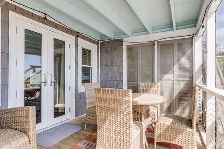 Screened porch dining