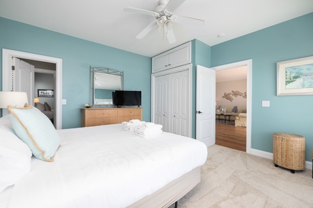 Just off the downstairs living is your king bedroom