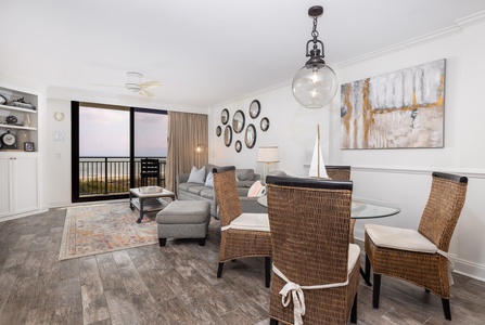 Unwind in your elegant living space with comfortable seating, coastal decor, and stunning views from your private balcony.