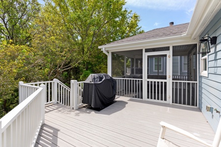 A spacious outdoor deck is a great place to grill out