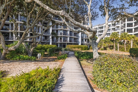 Shipwatch Villas offers lush landscaping and wooden boardwalks with direct beach access