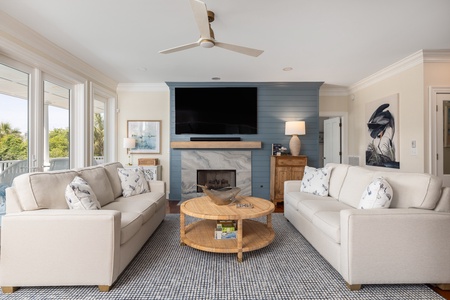 Your main level has this charming living space with access to the balcony